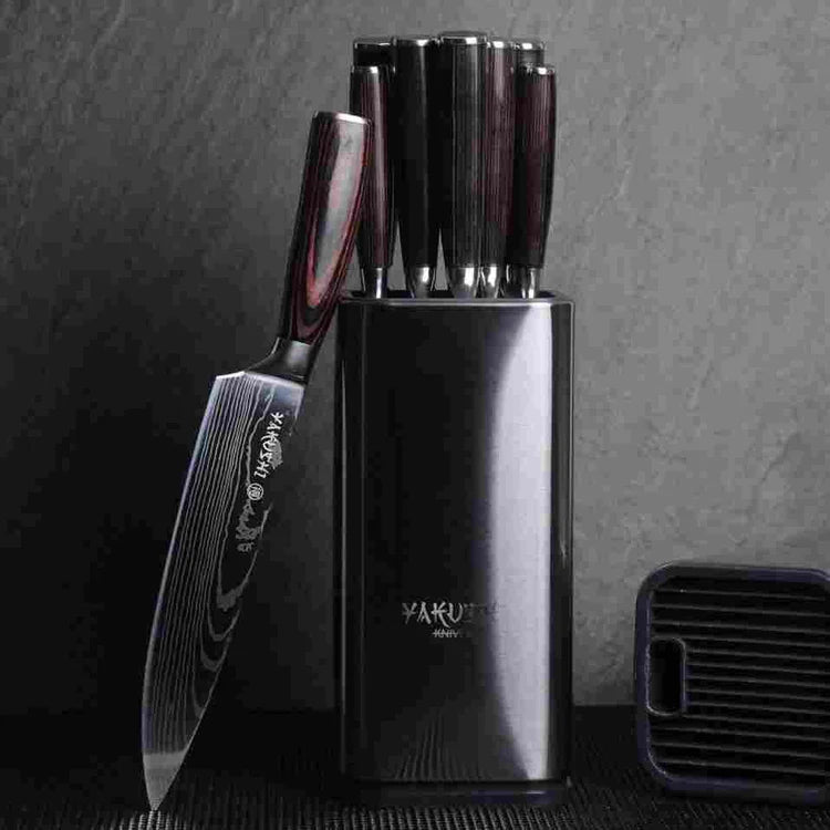 Yakushi stainless steel countertop knife holder storing Japanese kitchen knives in separate slots
